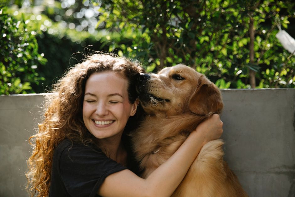 Julianna with a happy dog